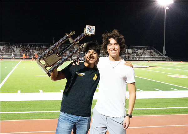  Boys holding trophy